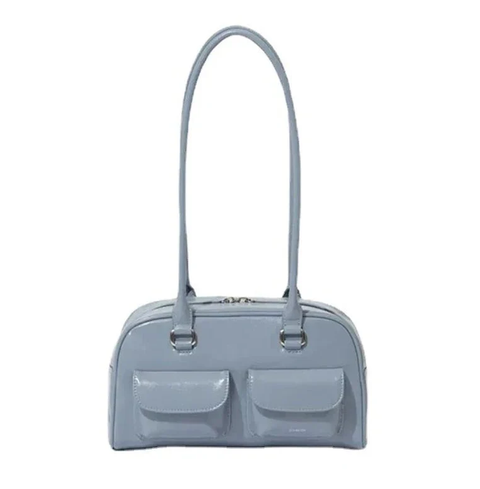 Light blue handbag with a strap on a white background