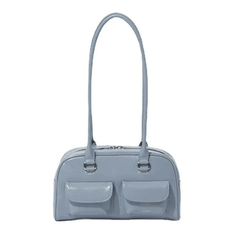 Light blue handbag with a strap on a white background