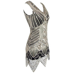 Black and white patterned dress with intricate designs on a white background