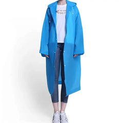 Person wearing a blue raincoat on a white background
