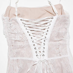White lace dress with a corset-style bodice on a hanger against a white background