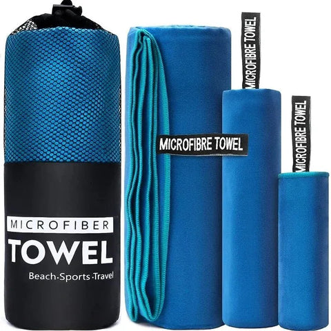 Set of blue microfiber towels with packaging on a white background