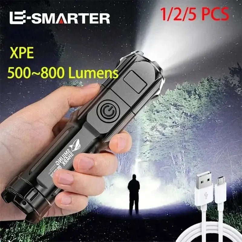 Hand holding a flashlight with 'E-Smarter' branding, showing lumens and USB cable.