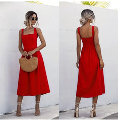 Woman wearing a red dress with a white background