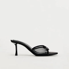 Black high-heeled sandal on a white background