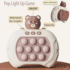 Pop light up game with bear design on a wooden surface