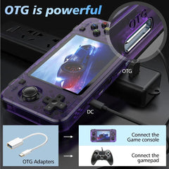 Purple handheld gaming console with OTG feature and adapter illustration
