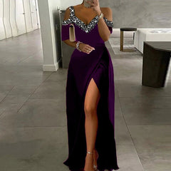 Person wearing a purple off-shoulder dress with a high slit in a modern interior setting.