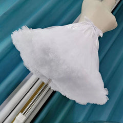 White lace petticoat on a blue background