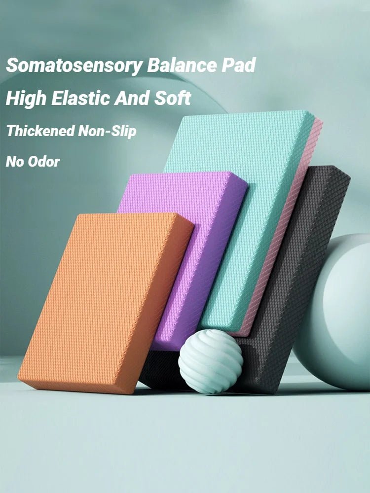 Somatosensory balance pads in various colors on a light blue background