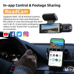 Car dashboard with RoadCam dash cam and smartphone displaying app interface.