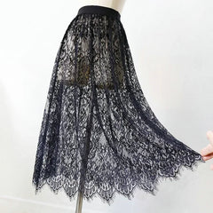 Black lace skirt on a mannequin against a white background