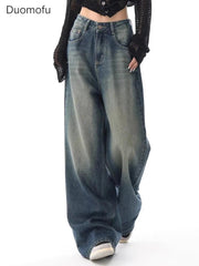 Wide-leg jeans worn by a person on a white background with 'Duomofu' branding.