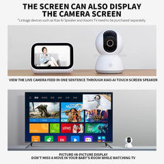Smart home device with screen displaying live camera feed and media player interface.