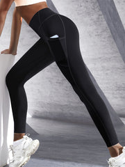 Person wearing black leggings with a white background