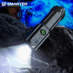 Flashlight on a rocky surface with 'E-Smarter' branding