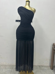Navy one-shoulder dress on a mannequin against a white wall.