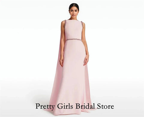 Pink evening gown on a white background with 'Pretty Girls Bridal Store' text.
