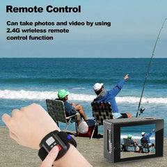 Person using a remote control device on a beach with others fishing