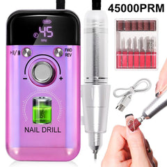 Purple nail drill with digital display, attachments, and hand using the drill.