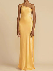 Yellow evening gown on a beige background