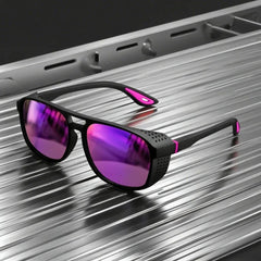 Sunglasses with purple lenses and black frames on a metallic surface