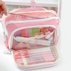 Pink mesh storage bag with clothes and hangers on a white background