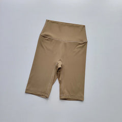 Beige shorts on a light gray background