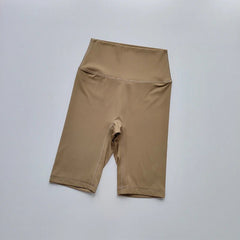Beige shorts on a light gray background
