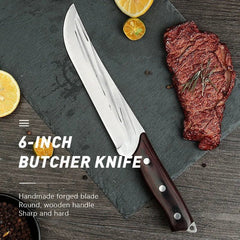 6-inch butcher knife with a wooden handle on a slate surface with a steak and lemon slices.