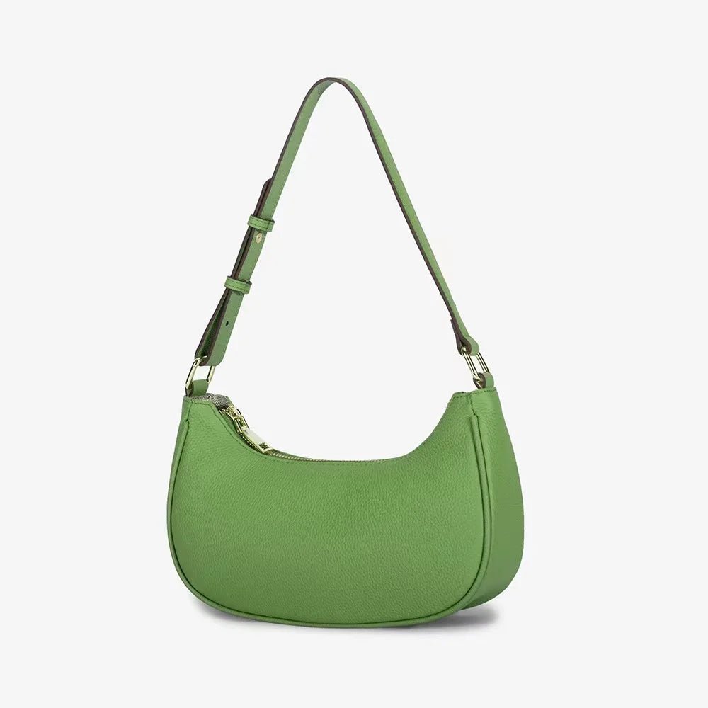 Green handbag on a light gray background