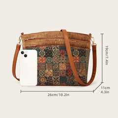Patterned handbag with brown strap and measurements on a white background