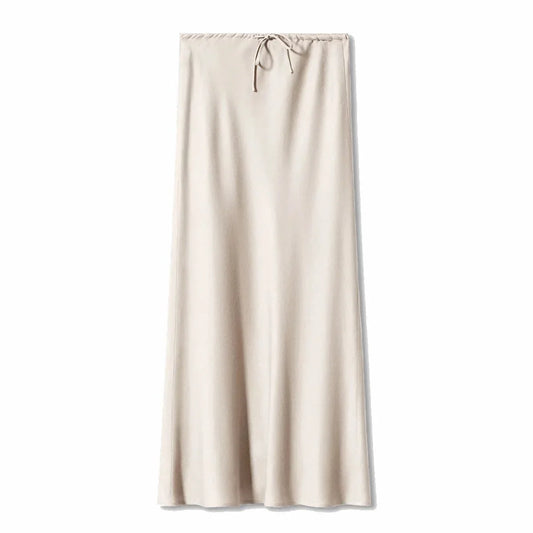Woman wearing a satin lace-up maxi skirt, from Modernicities' guide to skirts for every occasion