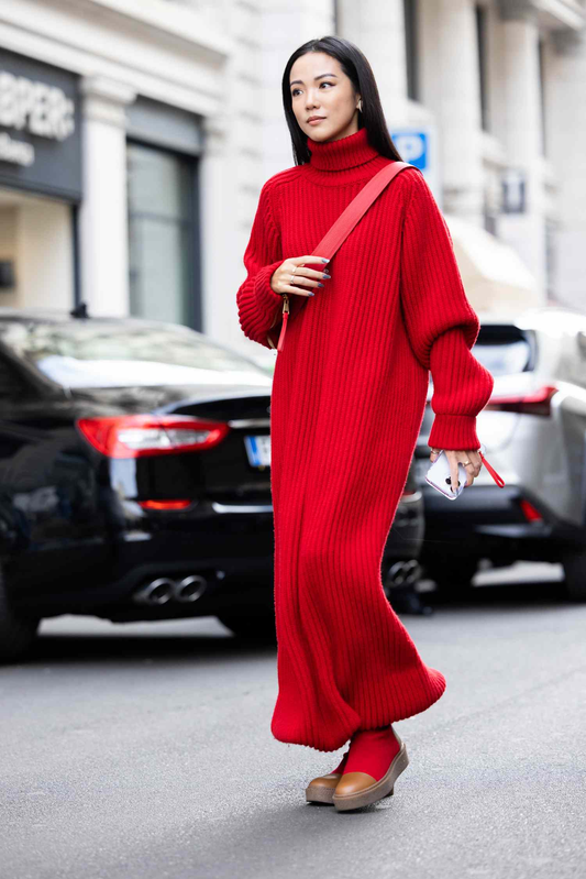 model wearing long red sweater dress