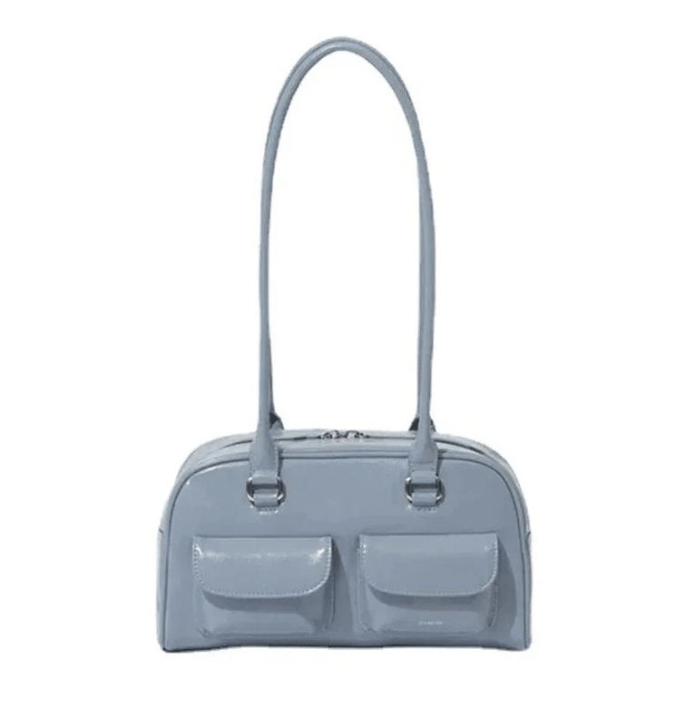 Light blue handbag with a strap on a white background