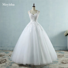White wedding dress on a mannequin against a light blue wall with 'Meyisha' branding.
