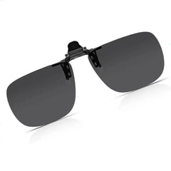Black sunglasses with flip-up lenses on a white background