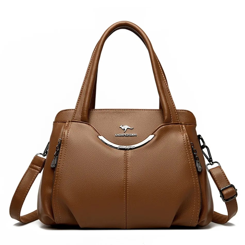 Brown handbag with a visible brand logo on a white background