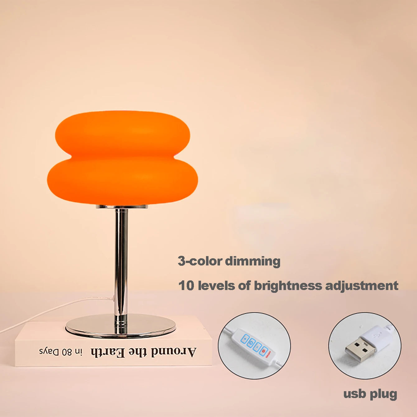 Orange lamp with 3-color dimming and USB plug on a beige background