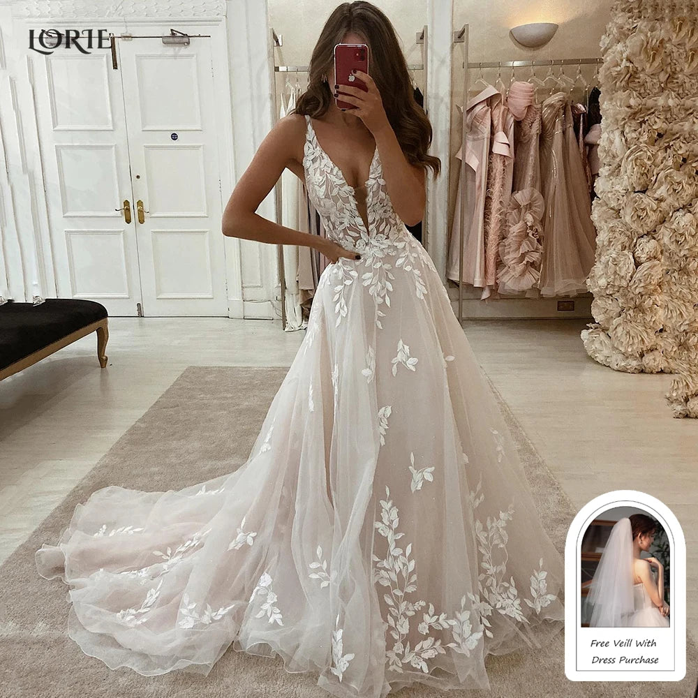 Woman in a white floral wedding dress taking a mirror selfie in a store.