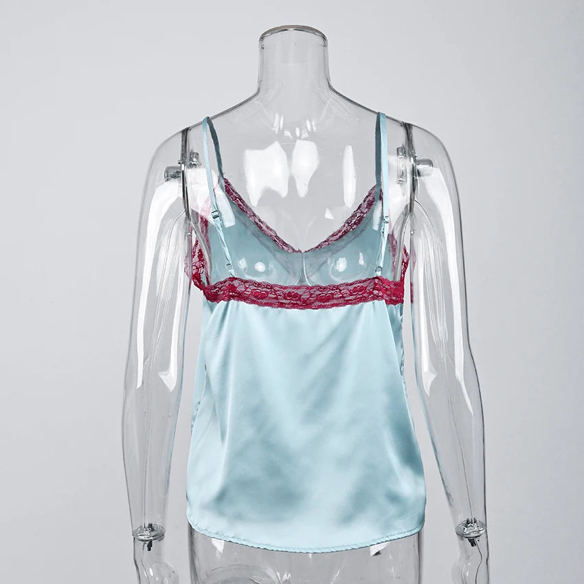 Light blue satin camisole with red lace trim on a transparent mannequin against a gray background