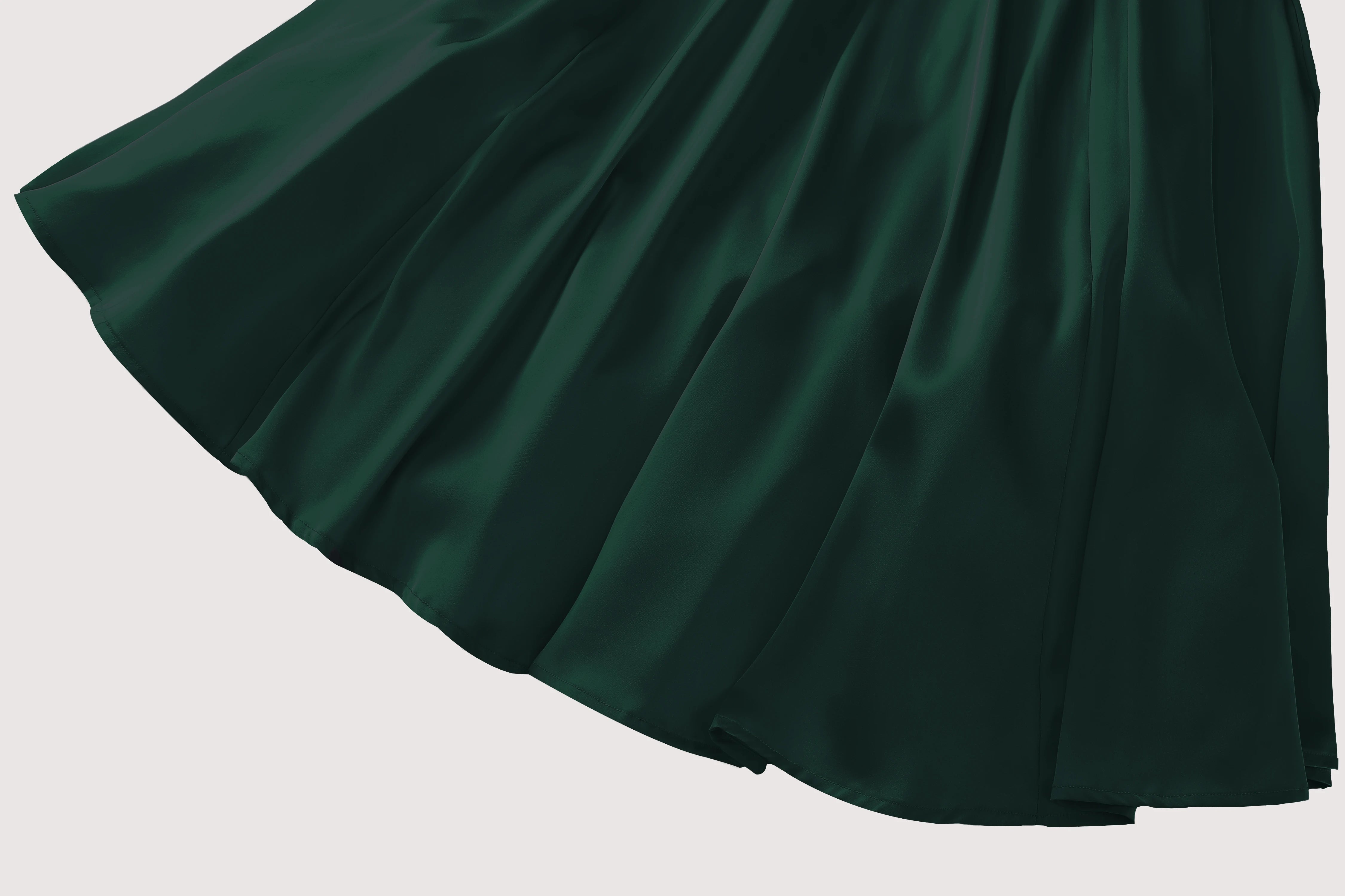 Dark green fabric swatch on a light gray background