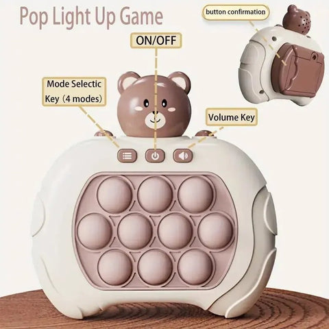 Pop light up game with bear design on a wooden surface