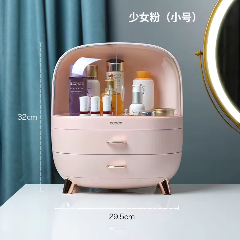 Pink cosmetic organizer with skincare products on a white surface, with measurements indicated.