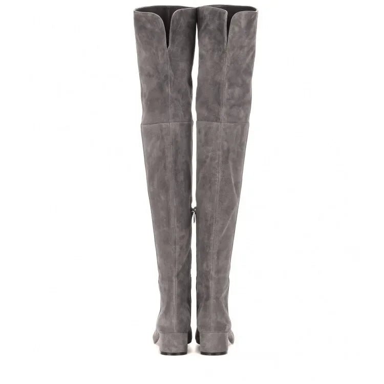 Gray suede over-the-knee boots on a white background