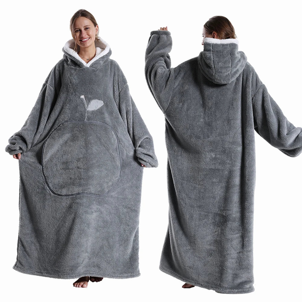 Gray hoodie with built-in blanket worn by a person on a white background