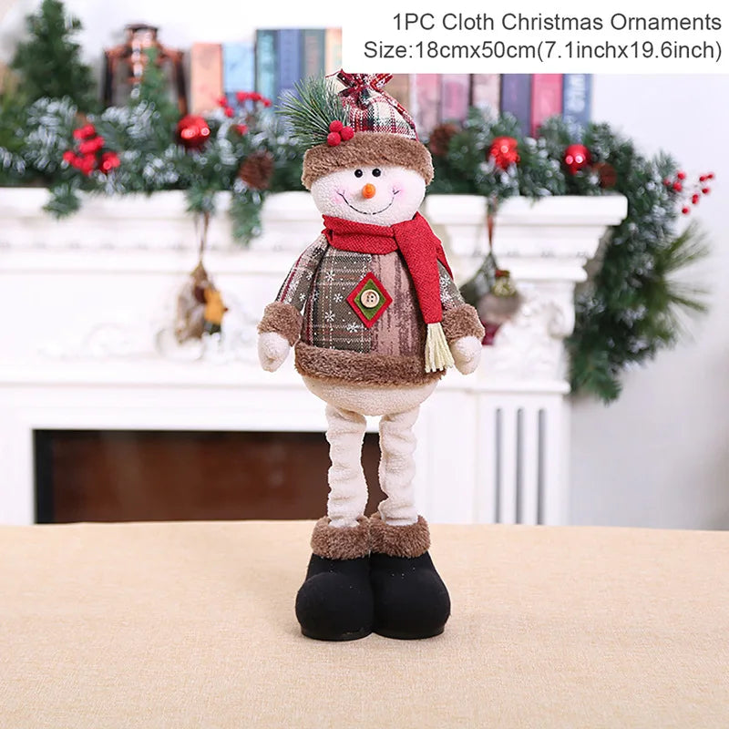 Decorative snowman ornament with a red scarf on a table in front of a fireplace decorated for Christmas.