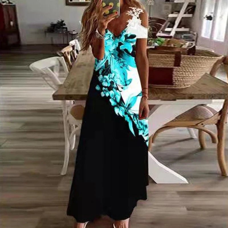 Woman wearing a black and blue floral dress in a dining room setting