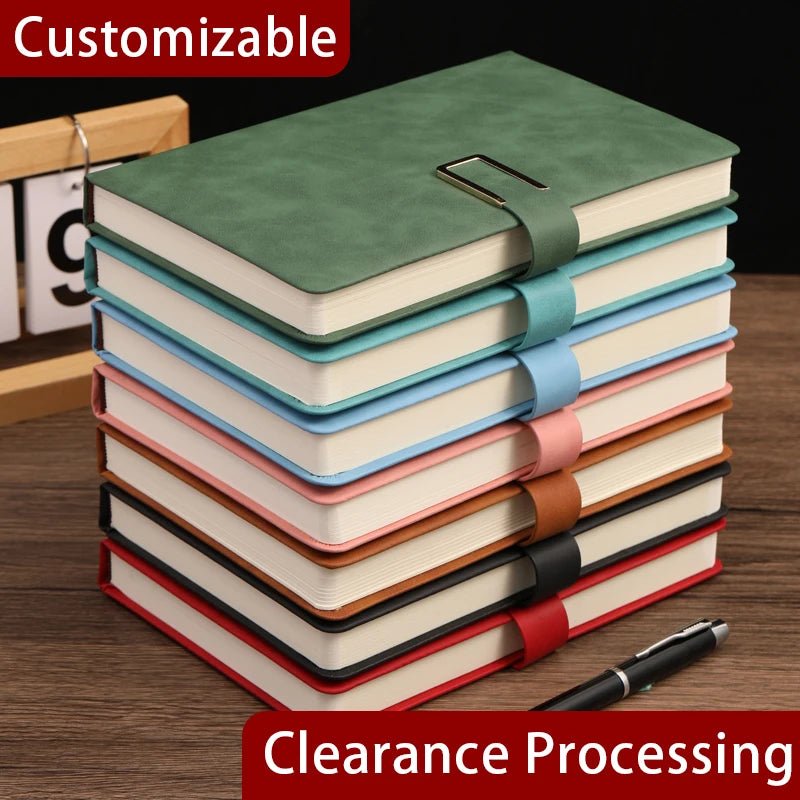 Stack of colorful notebooks with a pen on a wooden surface, featuring customizable and clearance processing text.