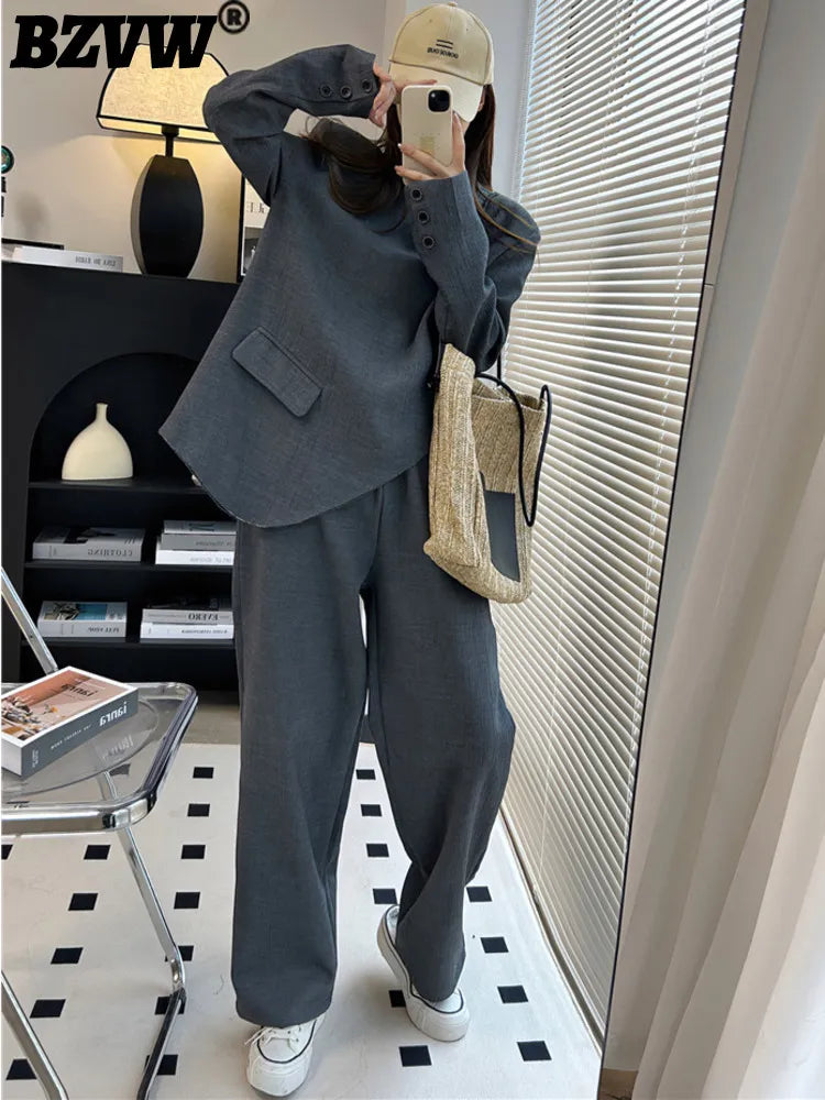 model wearing 2 piece pant suit